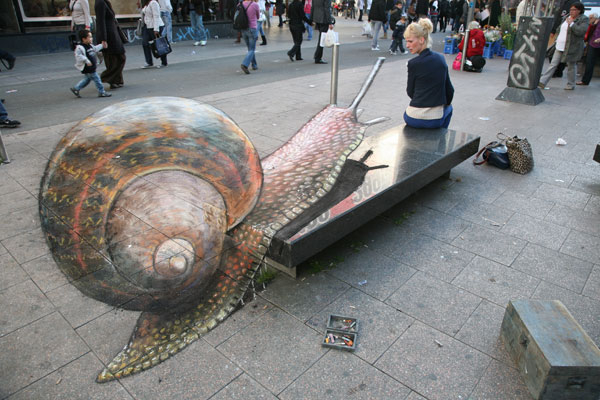 3D Chalk drawing of a giant snake crawling on a public bench with a real woman looking at it in a surprise