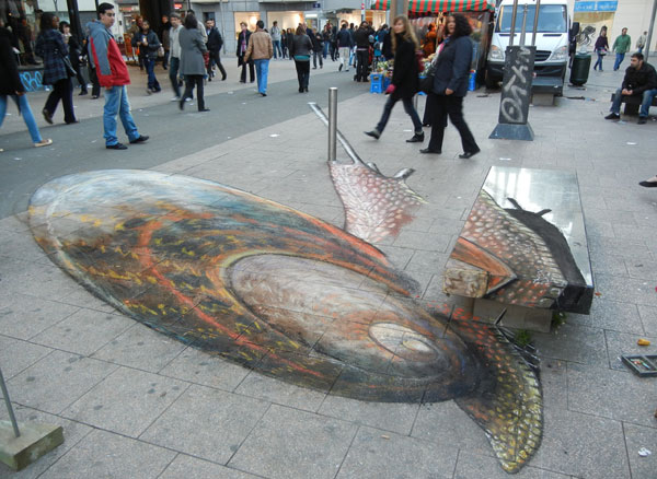 Distorted view of the giant snail. Some of it was drawn on the bench and on a pillar to make the illusion work