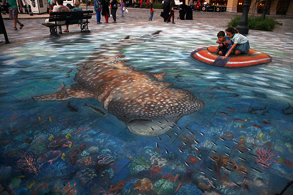 3D drawing of a whaleshark and a dingy with real people on it
